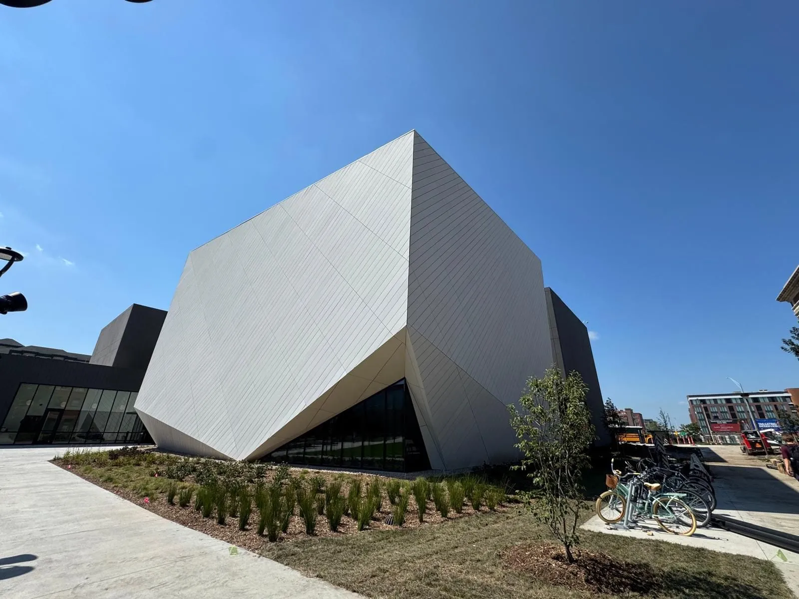 UNL Westbrook Music Building — Swisspearl fiber cement installation, SikaTack glue-on application.