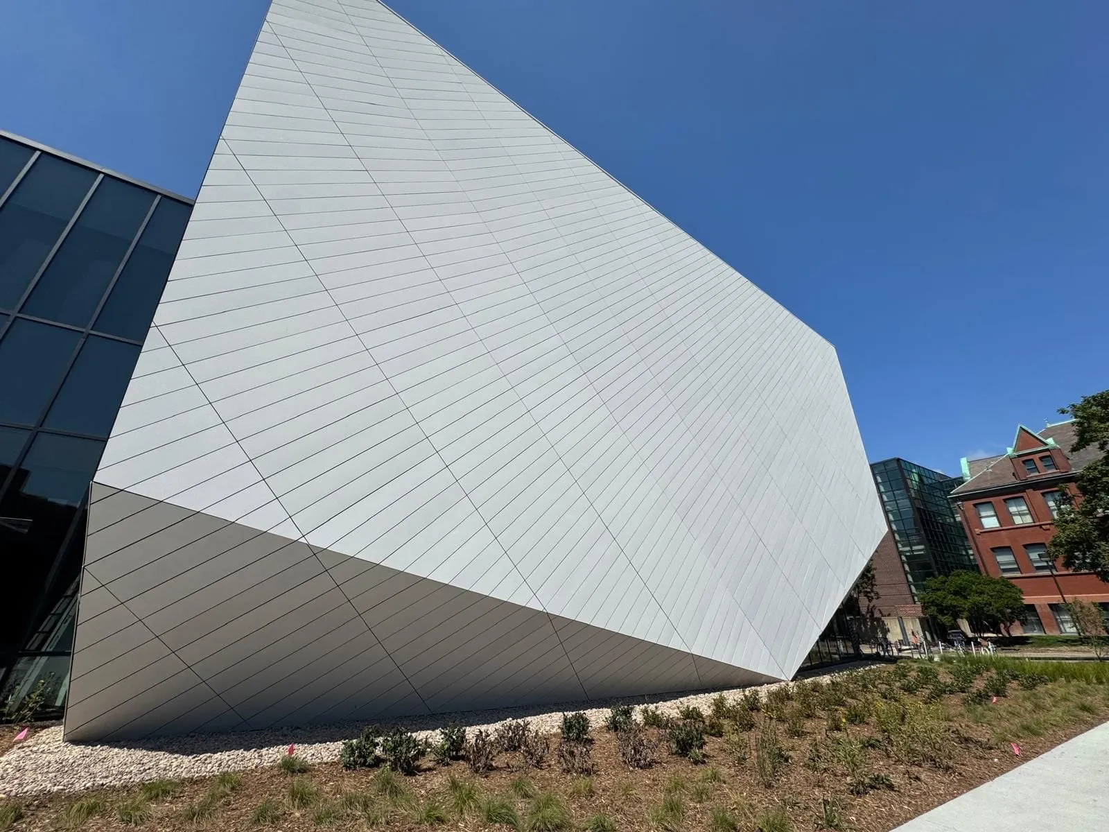UNL Westbrook Music Building — Swisspearl fiber cement installation, SikaTack glue-on application. (2/16)