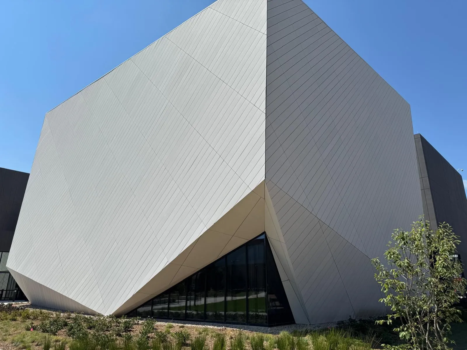 UNL Westbrook Music Building — Swisspearl fiber cement installation, SikaTack glue-on application. (3/16)