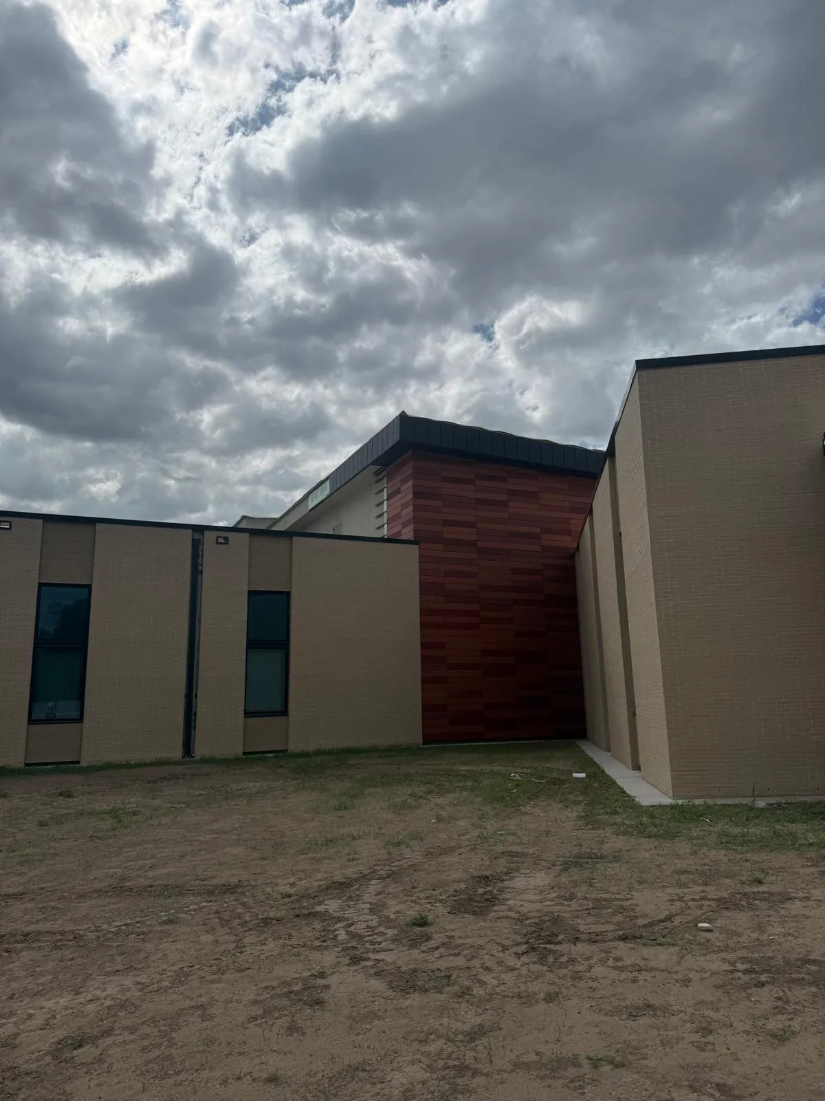 Wichita Behavioral Health — Terracotta rainscreen installation. (3/9)