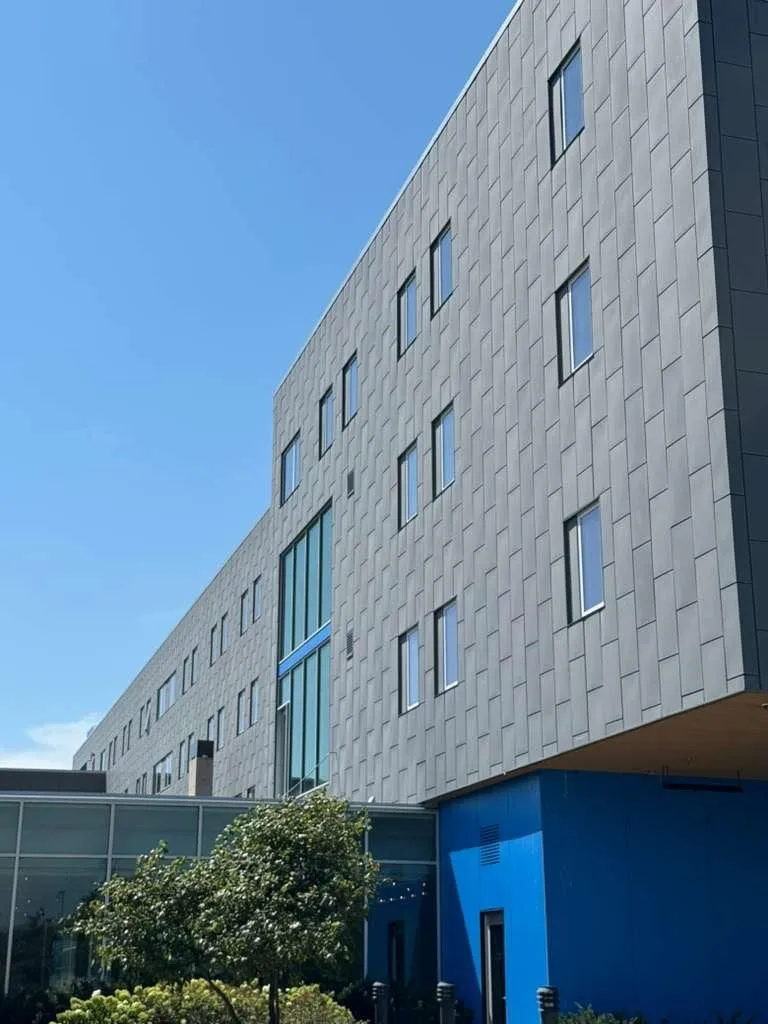 Newman Center Catholic Church — Dri-Design metal wall panel installation. (3/10)