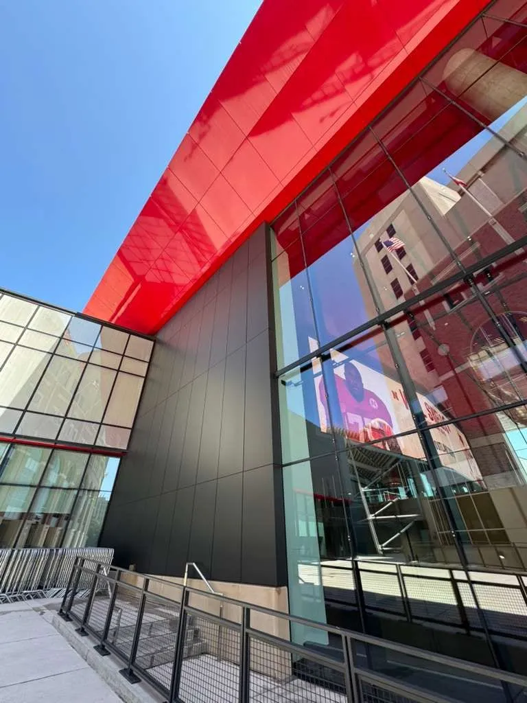 UNL Stadium Expansion — ACM installation across the canopy fascia, soffit and exterior elevations. (5/15)
