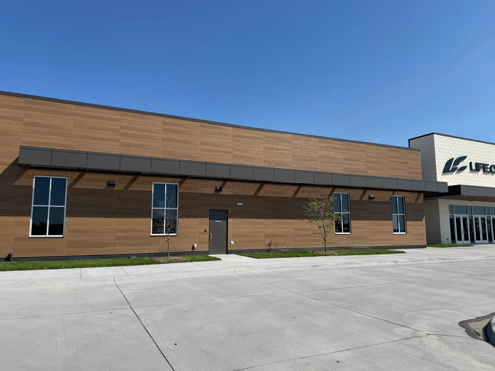 Life Church — Installation of both exterior cladding systems: ACM and Nichiha AWP 3030. (7/11)