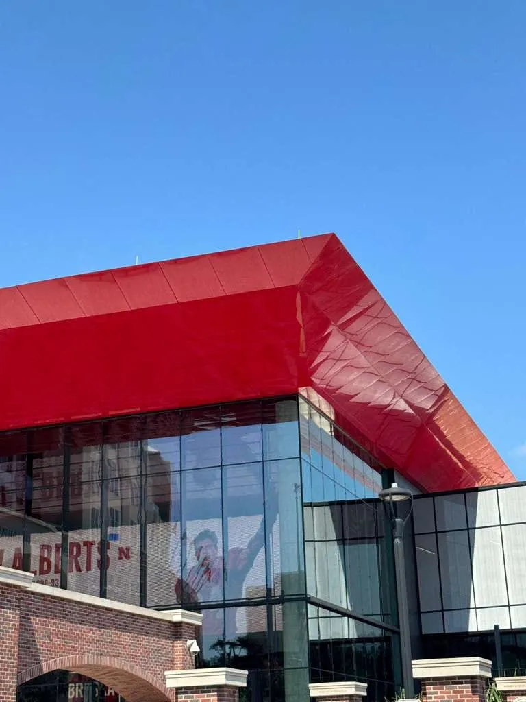 UNL Stadium Expansion — ACM installation across the canopy fascia, soffit and exterior elevations. (7/15)