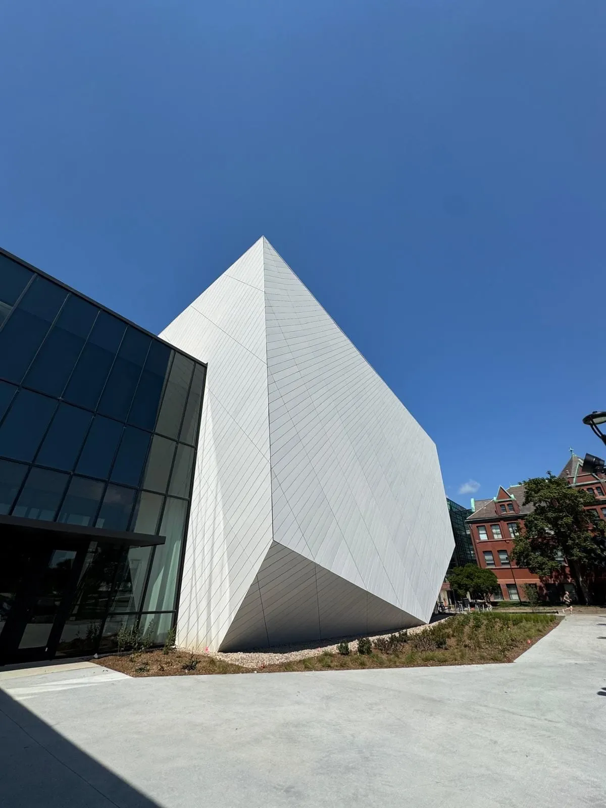 UNL Westbrook Music Building — Swisspearl fiber cement installation, SikaTack glue-on application. (7/16)