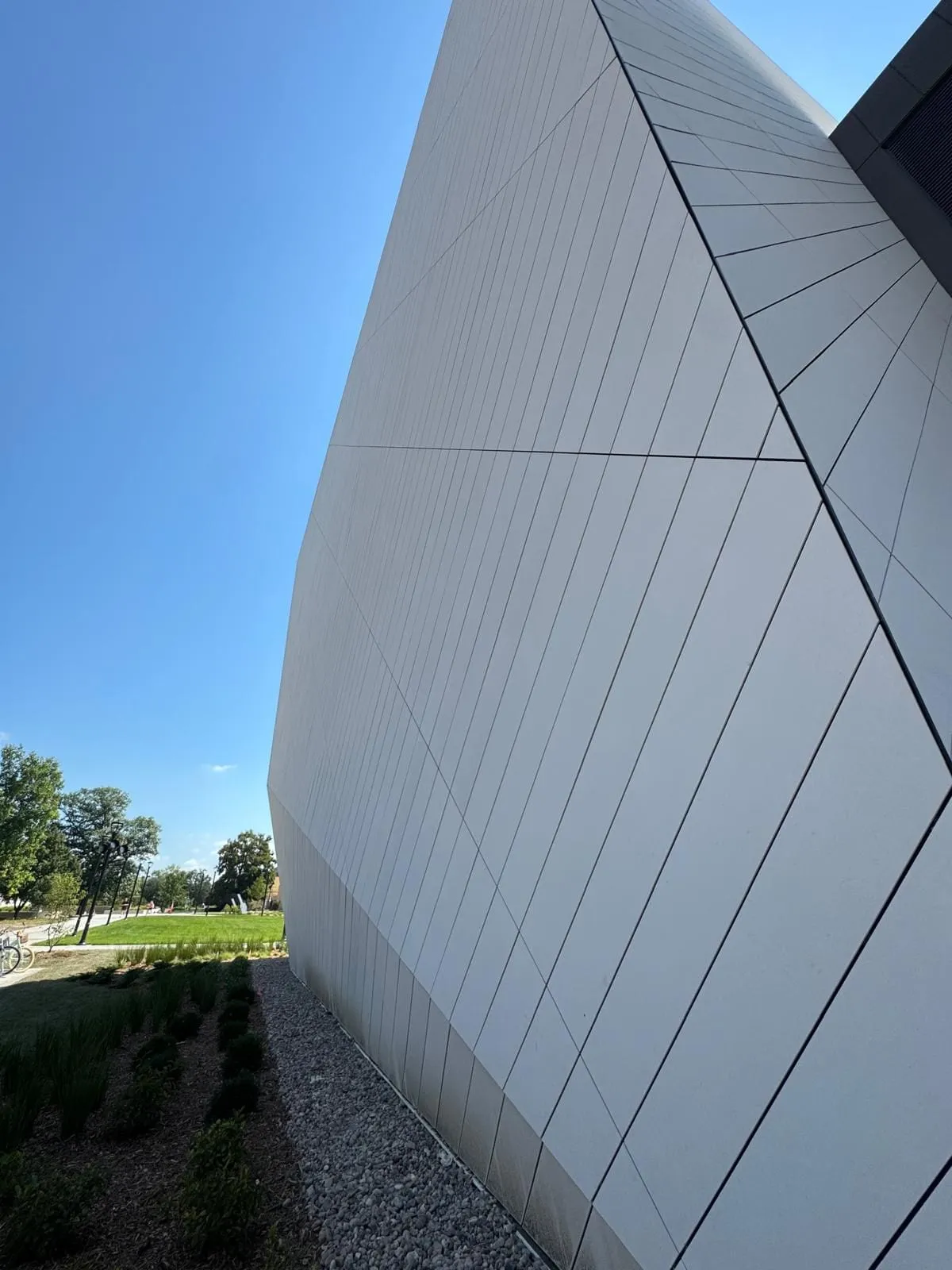 UNL Westbrook Music Building — Swisspearl fiber cement installation, SikaTack glue-on application. (8/16)