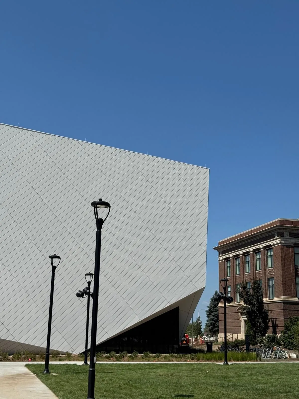 UNL Westbrook Music Building — Swisspearl fiber cement installation, SikaTack glue-on application. (9/16)