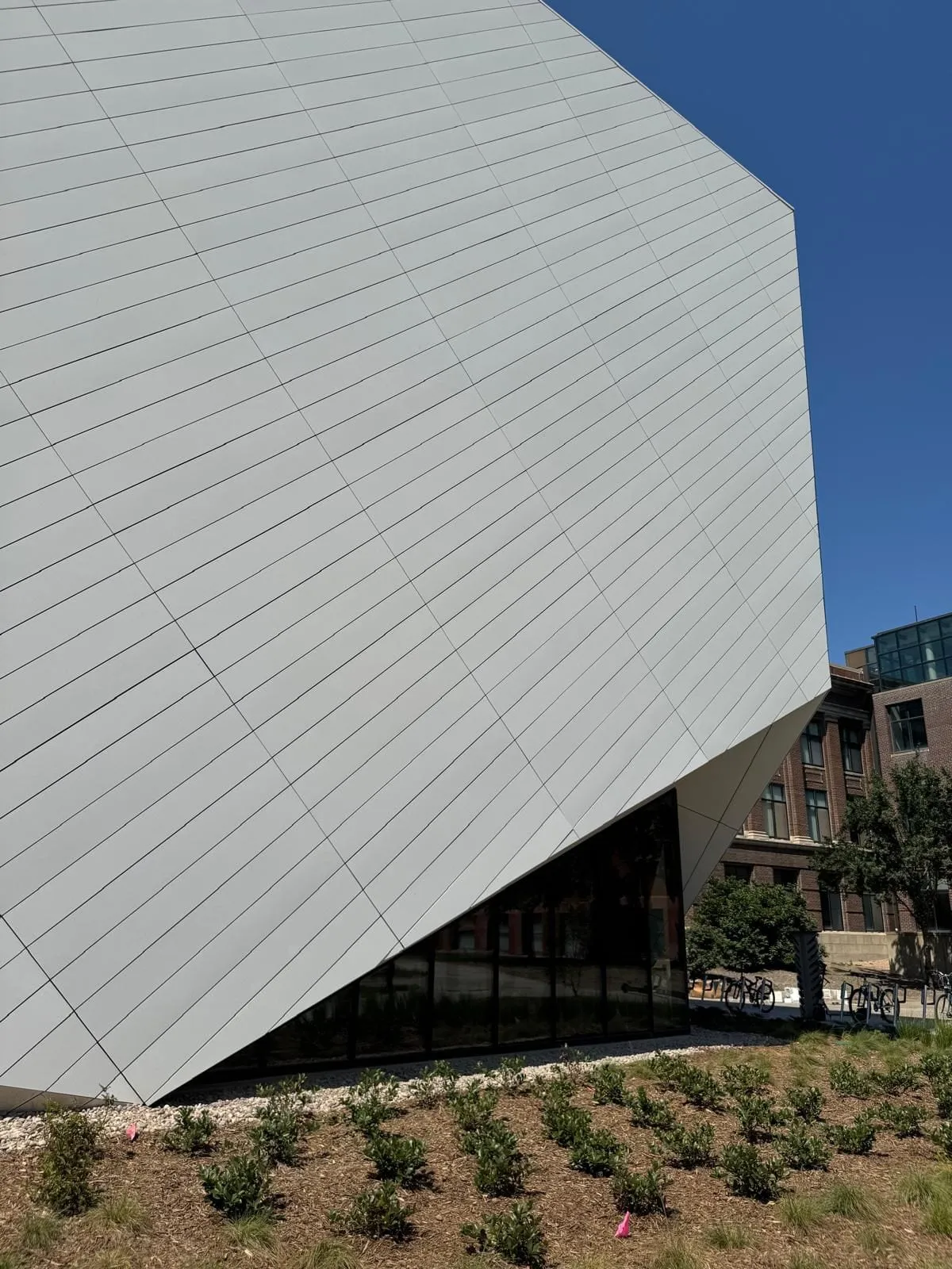 UNL Westbrook Music Building — Swisspearl fiber cement installation, SikaTack glue-on application. (11/16)
