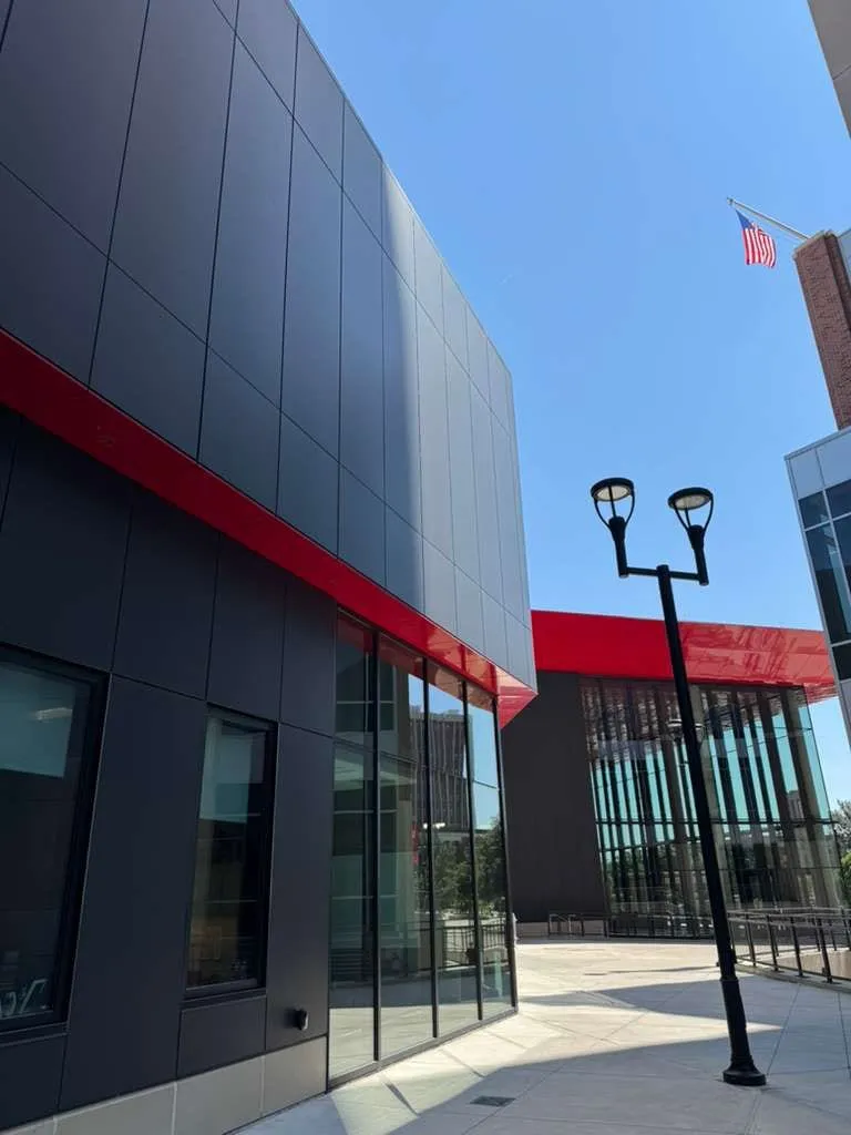 UNL Stadium Expansion — ACM installation across the canopy fascia, soffit and exterior elevations. (11/15)