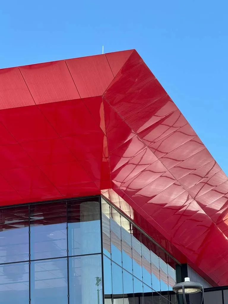 UNL Stadium Expansion — ACM installation across the canopy fascia, soffit and exterior elevations. (12/15)