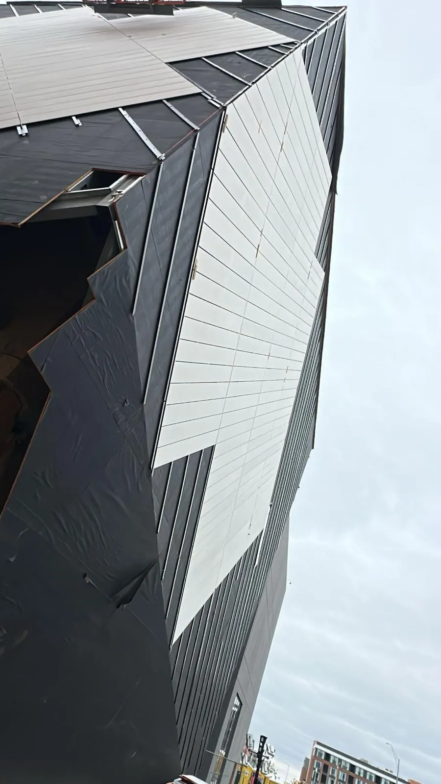UNL Westbrook Music Building — Swisspearl fiber cement installation, SikaTack glue-on application. (12/16)
