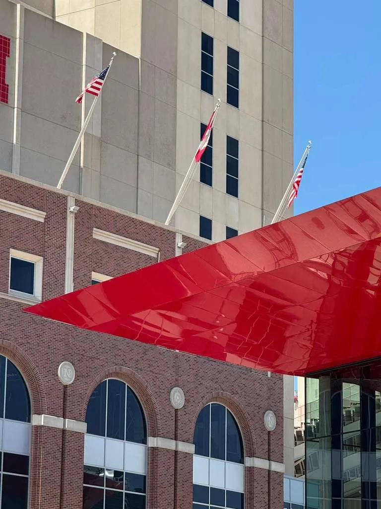 UNL Stadium Expansion — ACM installation across the canopy fascia, soffit and exterior elevations. (13/15)