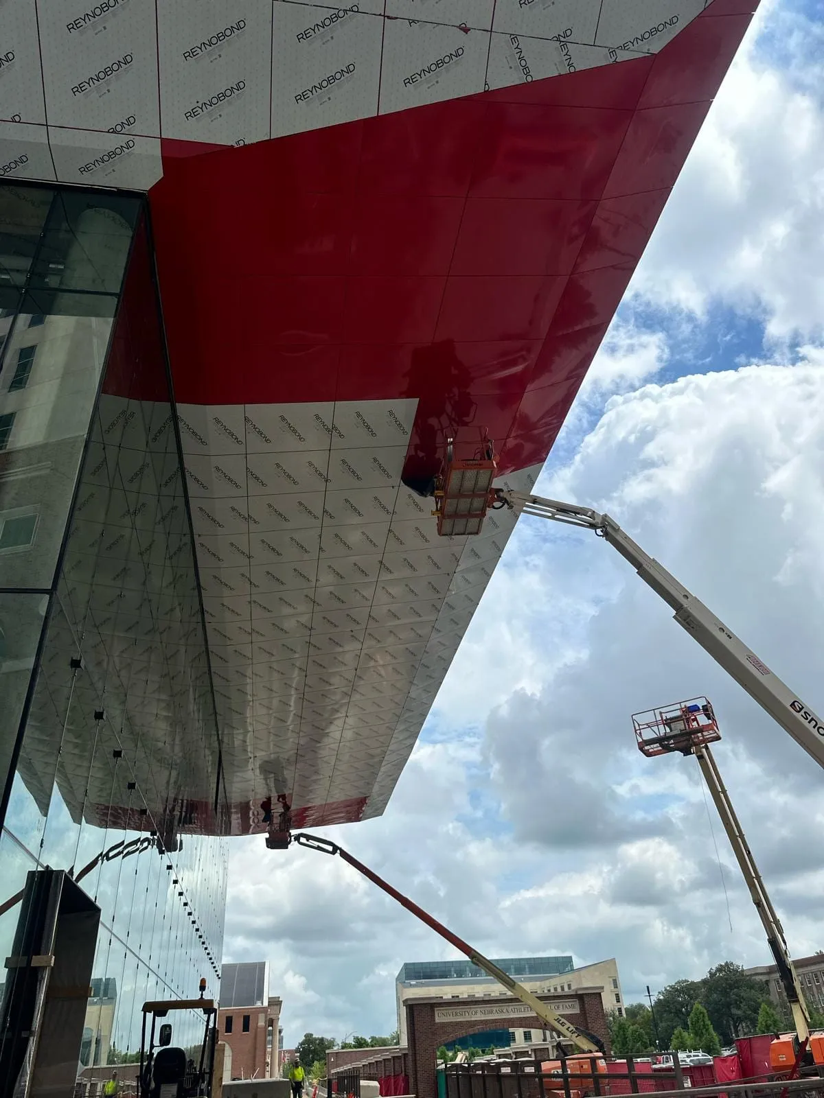 UNL Stadium Expansion — ACM installation across the canopy fascia, soffit and exterior elevations. (15/15)